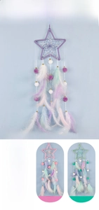 Detailed view of handmade star-shaped dreamcatchers with colorful feathers and soft pom-poms