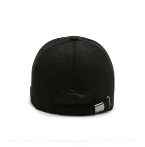 Rear view detail of black wool baseball cap featuring adjustable metal buckle strap