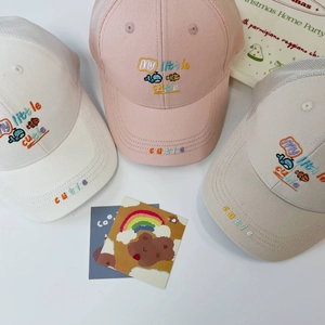 Detailed close-up of kids mesh sun hats with cute fish embroidery and breathable fabric