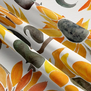 Close-up of soft floral tapestry fabric showing sunflower print texture and fibers