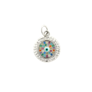 Macro shot of silver evil eye pendant with blue enamel center and colorful zircons