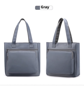 Detailed views of a dark grey waterproof nylon tote bag with functional front zipper pocket