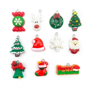 Set of 11 assorted Christmas resin charms including reindeer and trees for DIY jewelry