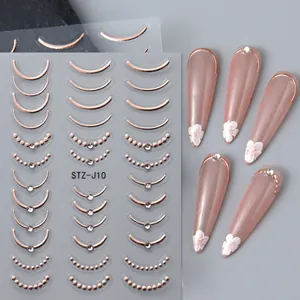 Détail macro des stickers ongles 5D or rose STZ-J10 avec strass tridimensionnels