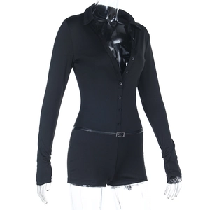 Detail of black slim-fit romper with button neckline and adjustable waist belt