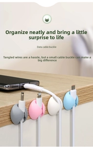 Close-up of silicone data cable buckles in four colors for neat desktop wire management