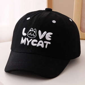 Detailed view of black cotton baseball cap with white LOVE MY CAT embroidery and cat motif