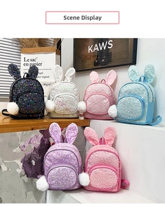 Kids sequin backpacks with bunny ears and pom-poms shown in various bright colors