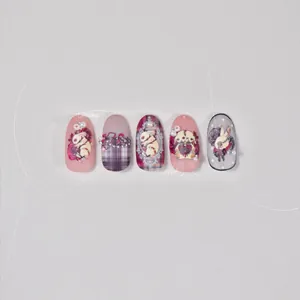 Detailed macro view of 5-piece Gothic Lolita press-on nails with dark rabbit and rose designs
