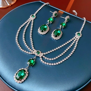 French style silver earrings with green oval crystal and sparkling diamond inlay