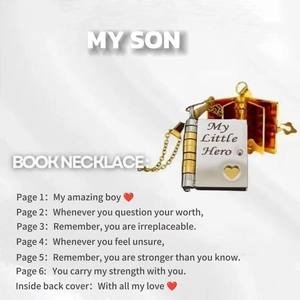 Detailed view of an openable book-shaped pendant with My Little Hero engraving for sons