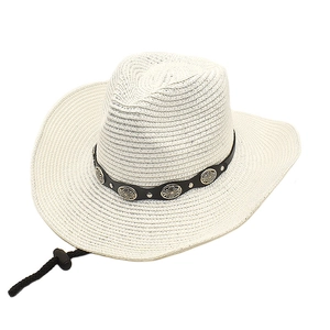 Detail of white straw cowboy hat with leather band and engraved metal concho accents