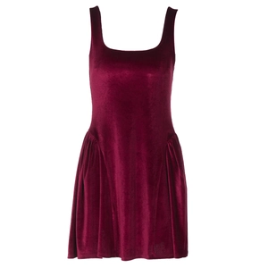 Detail of burgundy velvet dress featuring square neckline and pleated waist texture