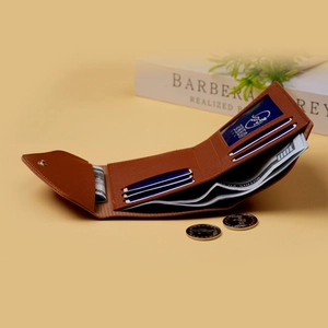 Detailed view of the brown tri-fold wallet showing multiple card slots and cash compartment