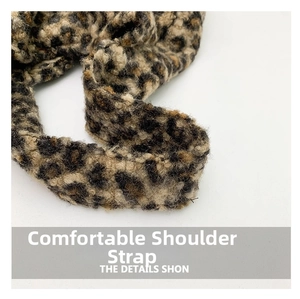 Close-up of fluffy leopard print shoulder strap with soft plush texture details