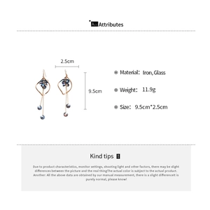 Detailed specs of twisted metal fringe earrings with blue glass beads and measurements