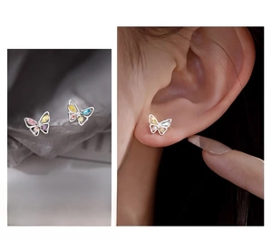 Detail of s999 sterling silver butterfly studs with colorful cubic zirconia stones