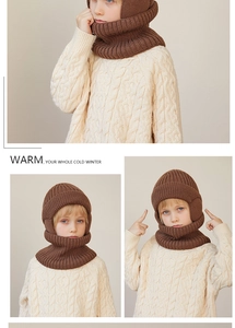 Detail of dark brown knitted children's hood scarf set showing warm plush texture