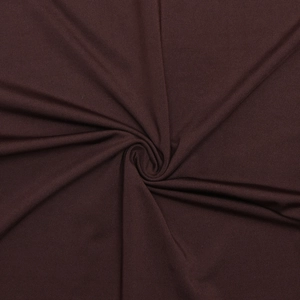 Detailansicht von dunkelbraunem Seidenstoff mit eleganter, spiralförmiger Textur