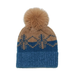 Close-up of winter knit hat featuring snowflake jacquard pattern and fluffy faux fur pompom