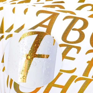 Detail showing waterproof feature on 3-inch gold glitter alphabet stickers for DIY decor
