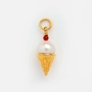 Detail of ice cream charm pendant with golden cone, white pearl and red top bead