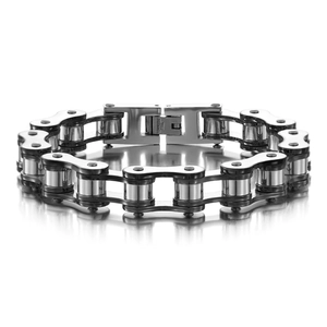 Detailed macro view of black and silver bicycle chain bracelet with stainless steel stamp