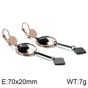 Detail view of rose gold and black heart drop earrings with size and weight specs