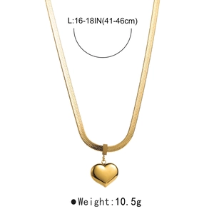 Detailed view of golden heart pendant necklace with flat herringbone chain and size labels