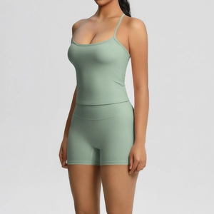 Slim fit sage green yoga set with camisole sports bra and high-waist biker shorts
