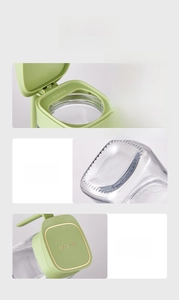 Detail view of glass spice jar with volume control scraper and thick non-slip base