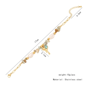 Detail showing beaded bracelet with heart dream charm and stainless steel measurements