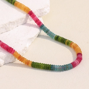 Detail of colorful tourmaline-style gemstone beads on 18K gold plated chain