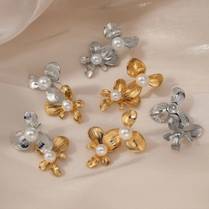 Floral stainless steel earrings with pearl centers in gold and silver finish