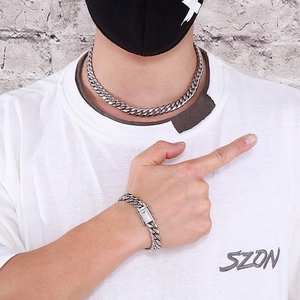 Polished silver Cuban link chain necklace and bracelet set with iced out diamond clasp
