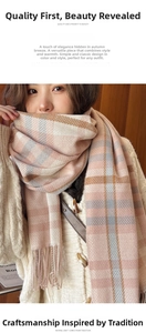 Detail of pink and grey plaid scarf with fine woven tassels in a soft autumn style