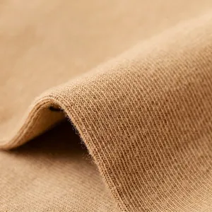 Close-up of khaki combed cotton five-finger socks showing premium ribbed knit texture