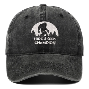 Washed charcoal baseball cap with Bigfoot Hide & Seek Champion embroidery and curved brim