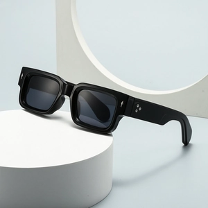 Classic black rectangular sunglasses with thick frames and silver metal stud accents