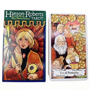 Detail view of Hanson-Roberts Tarot box and Ten of Pentacles card on white background