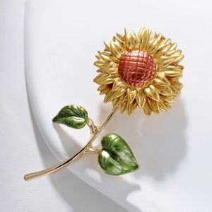 Macro detail of high-end alloy sunflower brooch with gold plating and enamel texture