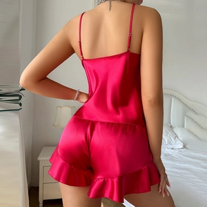 Women red silk satin pajama set featuring a camisole top and ruffled shorts in back view
