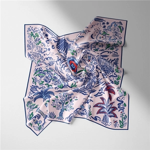 Detailed view of pink silk square scarf with hand-painted artistic nature illustrations