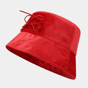 Women's vintage red bucket hat with double bow tie detail in soft textured fabric