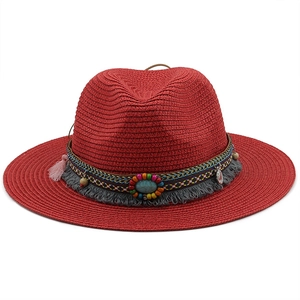 Red straw fedora hat with bohemian tassel band and turquoise stone for summer