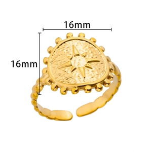 Detail showing 16mm gold plated sunburst signet ring with beaded edge and open band
