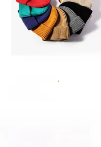 Detailed overhead view of diverse knit beanies in various colors with ribbed texture
