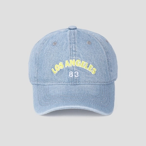 Detailed front view of light blue denim baseball cap with yellow Los Angeles embroidery