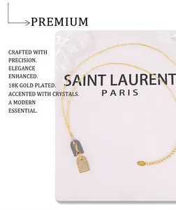 Detailed close-up of 18k gold-plated arch pendant necklace with shimmering zircon stones