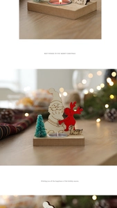 Close-up of wooden Christmas candle holder with Santa and reindeer desktop decorations